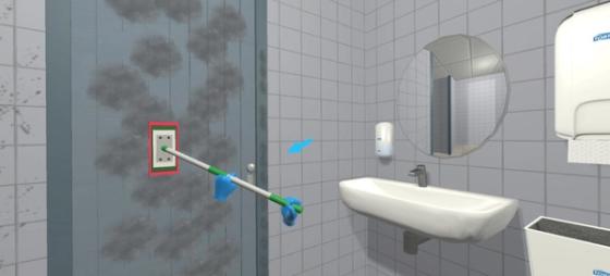 Cleaning Workx Periodic Sanitary module: cleaning a toilet door with the flat mop
